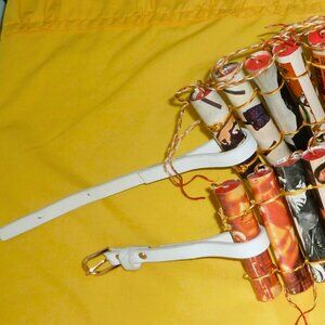 Portable and artistic belt made of cardboard dynamite sticks and posters
